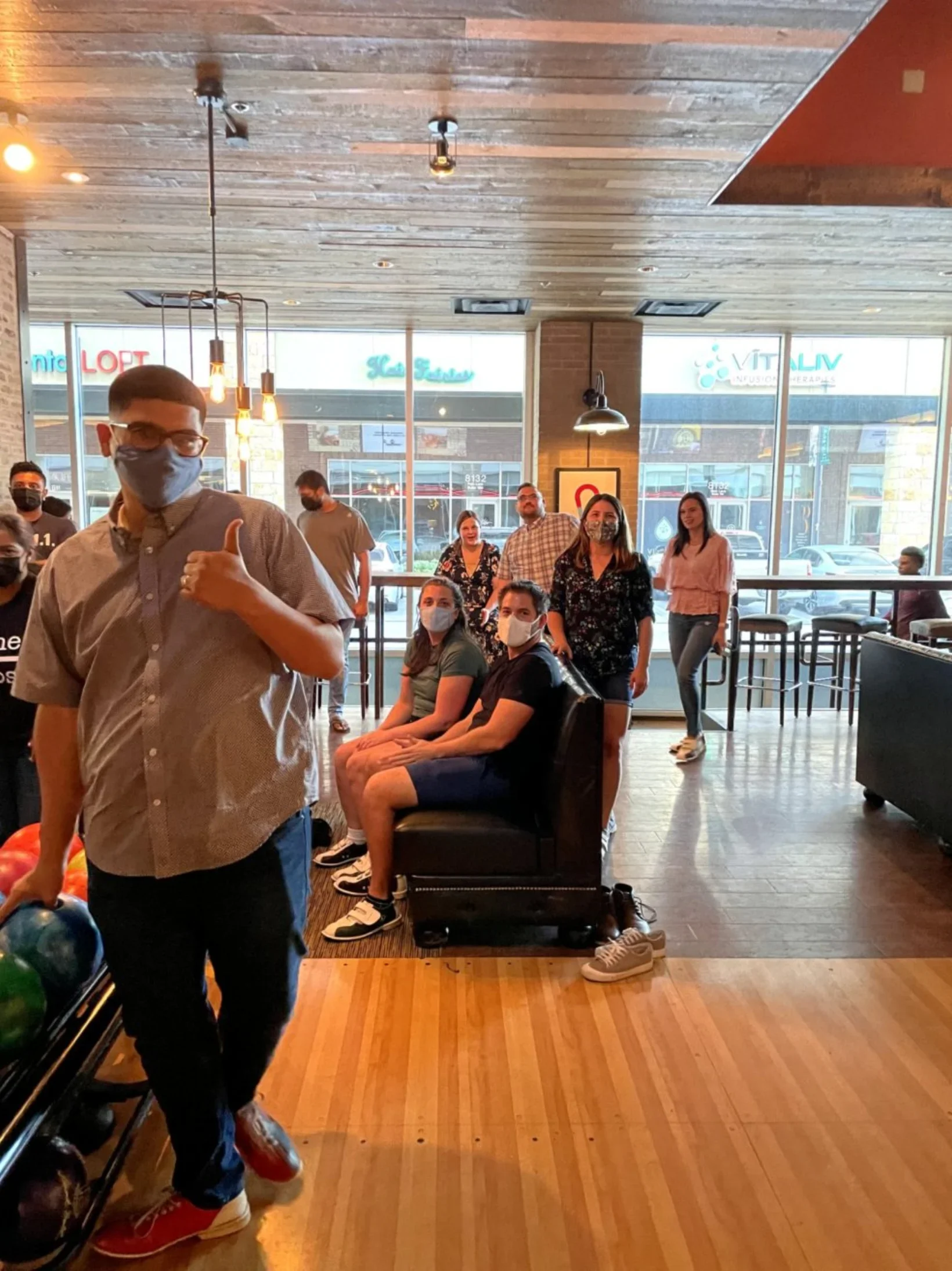 ITECS team enjoying bowling night team building event